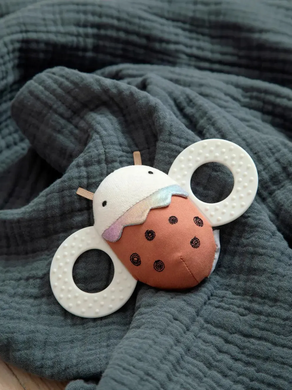 Sensoryczna zabawka z lusterkiem Luca Ladybird